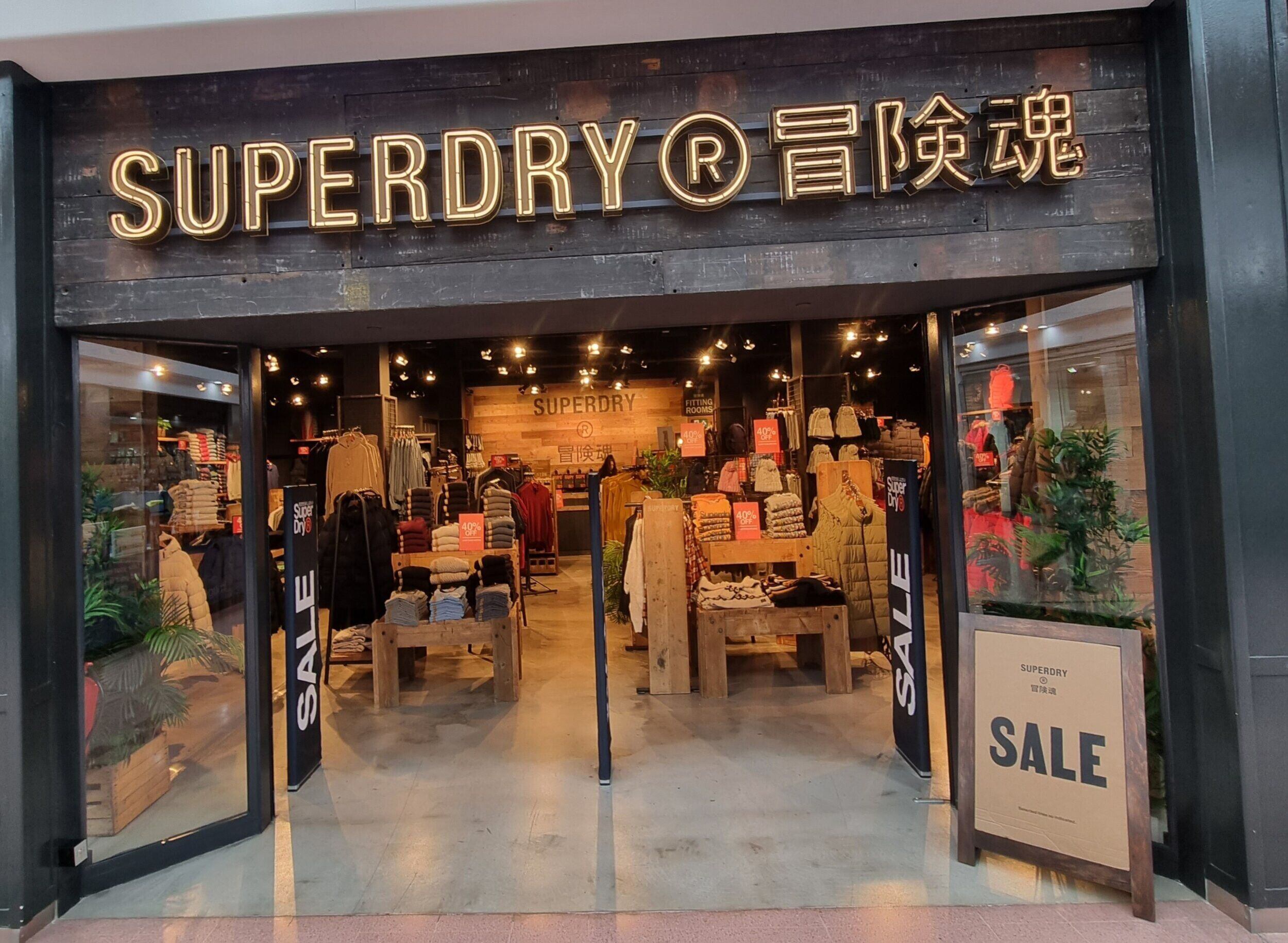 Superdry to close eight UK franchise stores