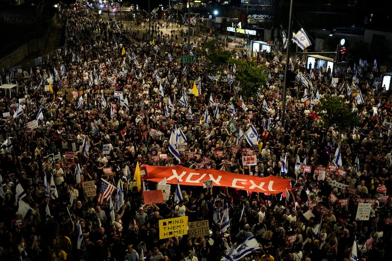 People protest against Israeli Prime Minister Benjamin Netanyahu’s government and call for the release of hostages held in the Gaza Strip by the Hamas militant group, in Tel Aviv, Israel (Leo Correa/AP)