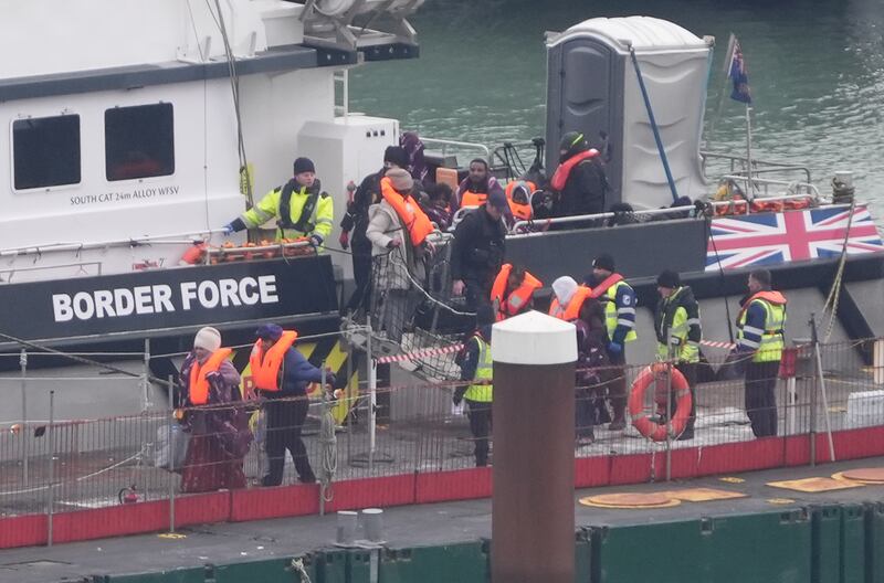 A group of people thought to be migrants are brought in to Dover, Kent, from a Border Force vessel following a small boat incident in the Channel