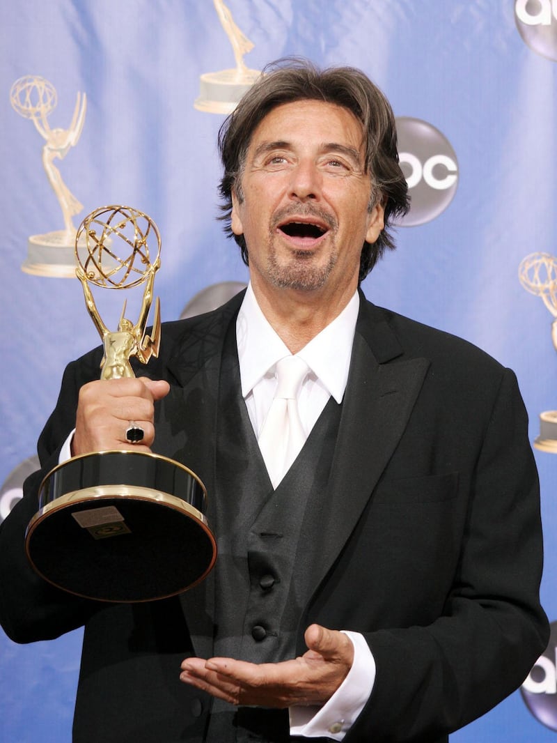 Al Pacino with his Emmy award for best lead actor for his role in Angels In America