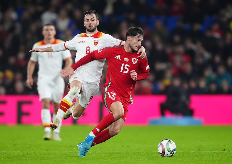 Liam Cullen (right) breaks through for Wales in their Nations League victory against Montenegro