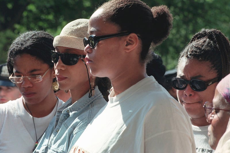 Malcolm X’s daughters Malikah Shabazz, left, Attallah Shabazz, second from left, Malaak Shabazz, third from left, and Gamilah Shabazz outside the Jacobi Medical Centre in the Bronx borough of New York following the death of their mother Betty Shabazz on June 23 1997 (Ron Frehm/AP)