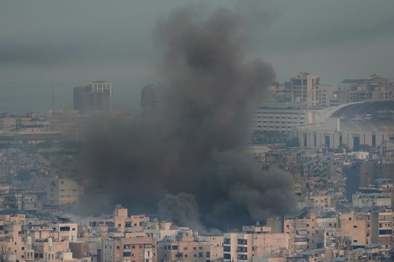 Smoke rises from Israeli air strikes in Beirut’s southern suburbs (Hussein Malla/AP)