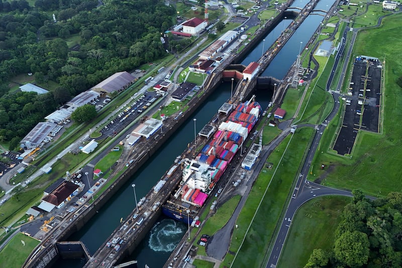 A cargo ship traverses the Agua Clara Locks of the Panama Canal in Colon, Panama (Matias Delacroix/AP)