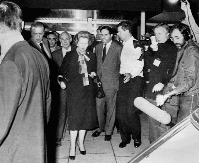 Then-prime minister Margaret Thatcher, helped by her husband Denis, leaving the Grand Hotel, Brighton following a bomb blast which ripped through the building causing severe damage and many injuries