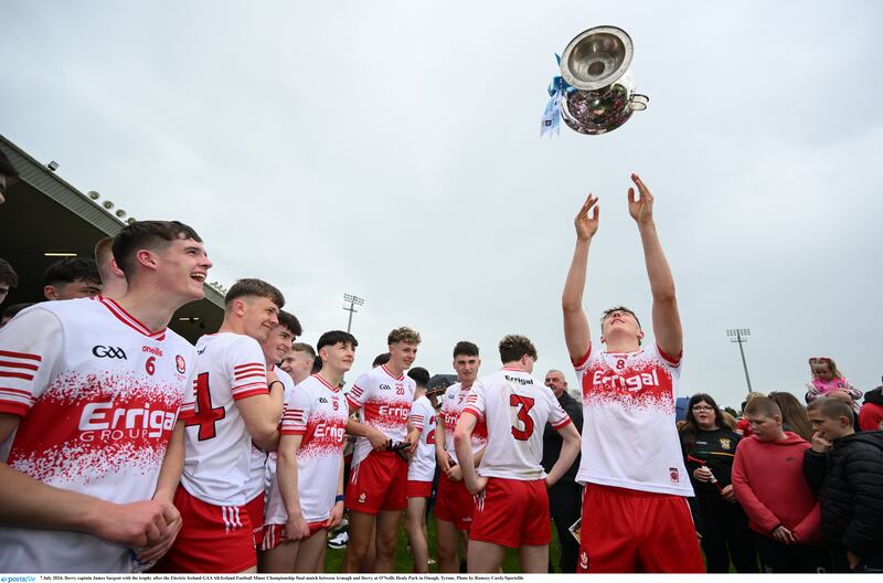 Derry captain James Sargent with the trophy after the Electric Ireland GAA All-Ireland Football Minor Championship final match between Armagh and Derry at O'Neills Healy Park in Omagh, Tyrone