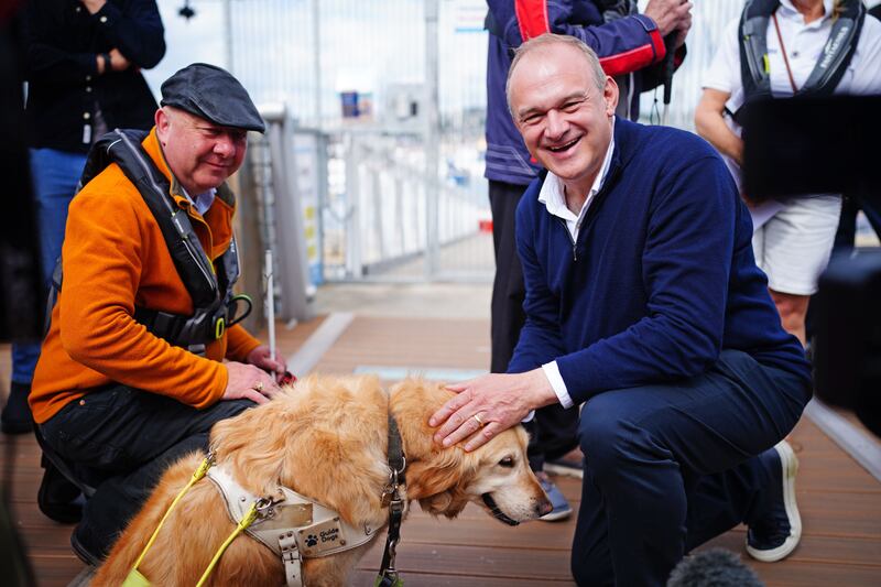 Torbay MP Steve Darling with his guide dog Jennie and Lib Dem leader Sir Ed Davey