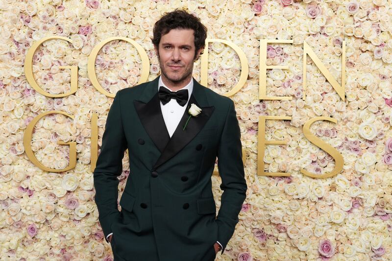 Adam Brody arriving at the 82nd Golden Globes on Sunday (Jordan Strauss/Invision/AP)