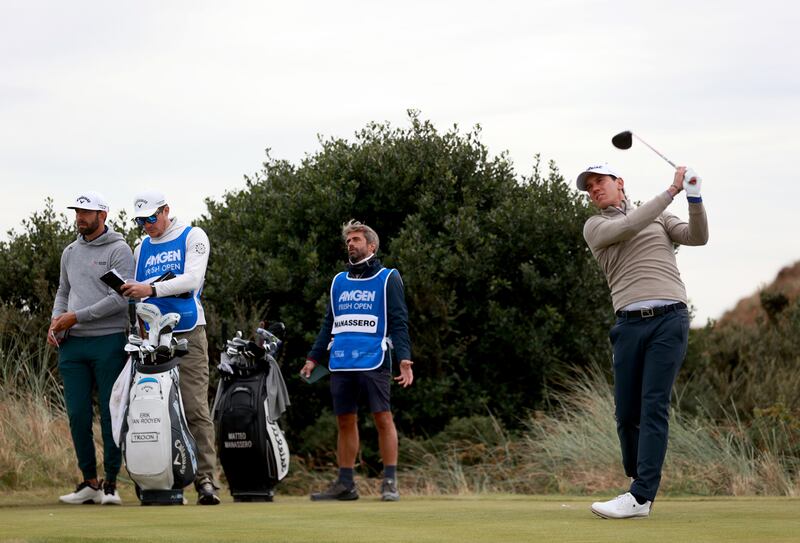 Italy’s Matteo Manassero watches his tee shot on the 11th hole during round two of the Amgen Irish Open