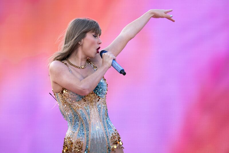 Taylor Swift performing on stage during her Eras Tour at the Murrayfield Stadium in Edinburgh