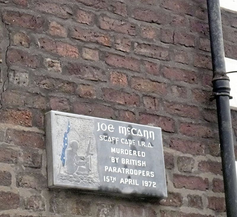 A memorial plaque in Joy Street in the Markets area of Belfast where IRA man Joe McCann was shot dead 