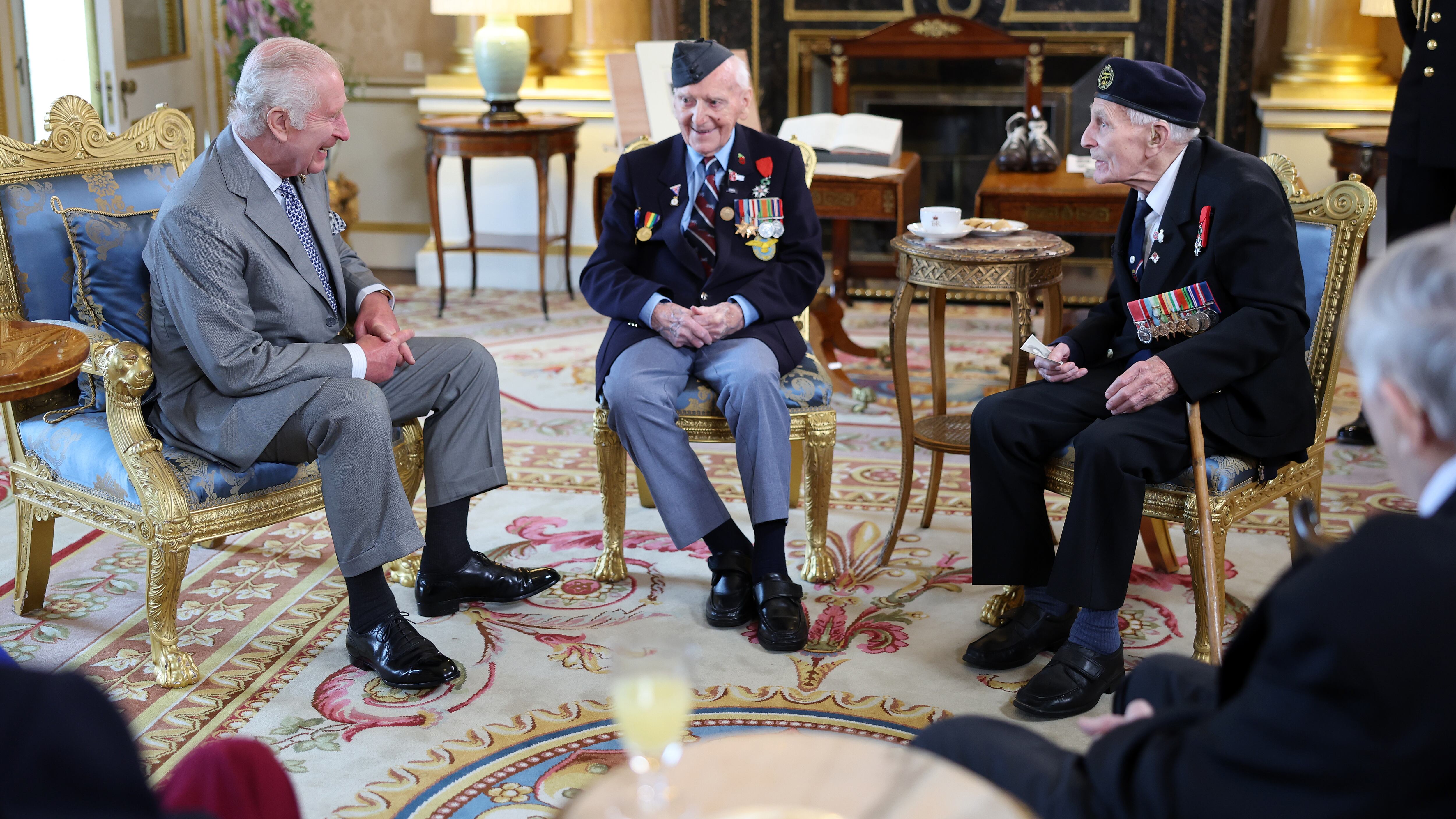 The King and Queen have hosted four D-Day veterans at Buckingham Palace to mark the 80th anniversary of the Normandy landings