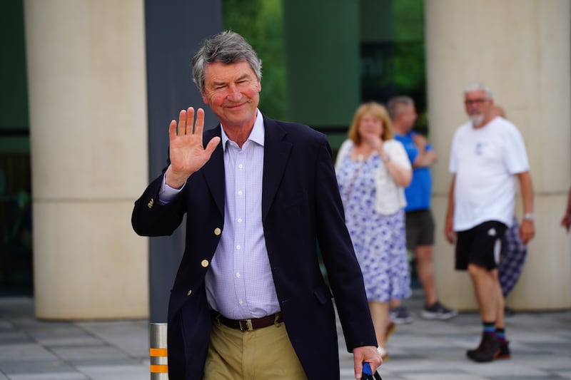 Vice Admiral Sir Tim Laurence leaving Southmead Hospital in Bristol after visiting his wife