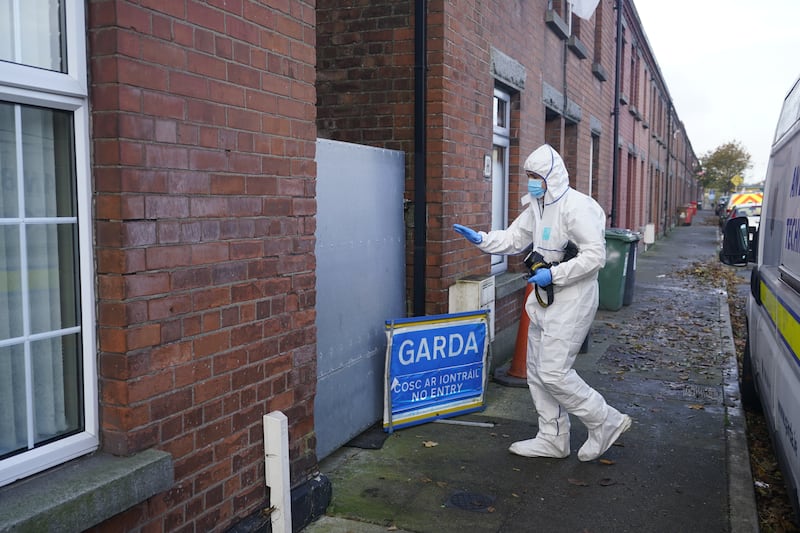 A gardai forensic officer in Dundalk, Co Louth, as they search a house in the investigation into the suspected murder of Kyran Durnin