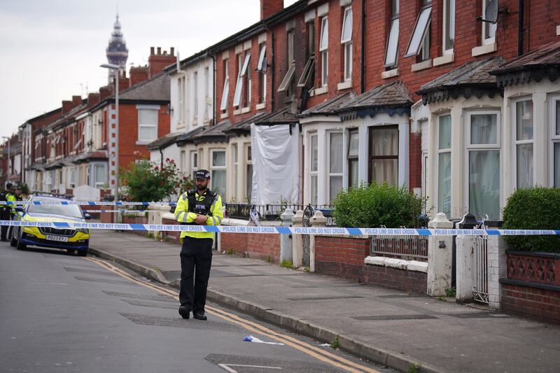 Firefighters and police officers were called to the address in Peter Street at 2.39am on Wednesday to reports of a blaze with people inside