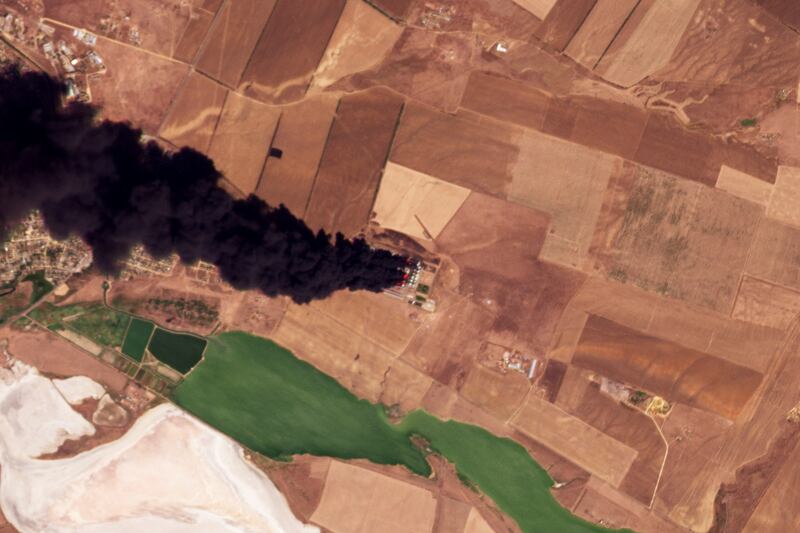 This satellite photo from Planet Labs PBC shows a fire at an oil depot earlier hit by a Ukrainian drone attack near Proletarsk (Planet Labs PBC via AP)