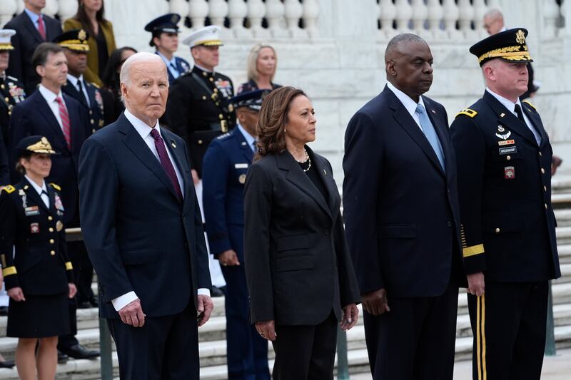 President Joe Biden and other officials at the Tomb of the Unknown Soldier at Arlington National Cemetery (Susan Walsh/AP)
