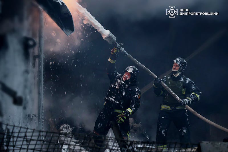 Firefighters put out a fire in Dnipropetrovsk (Ukrainian Emergency Service via AP)