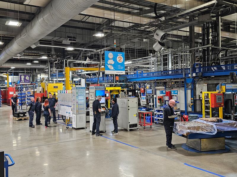 Workers on factory floor inside Copeland's Cookstown facility.