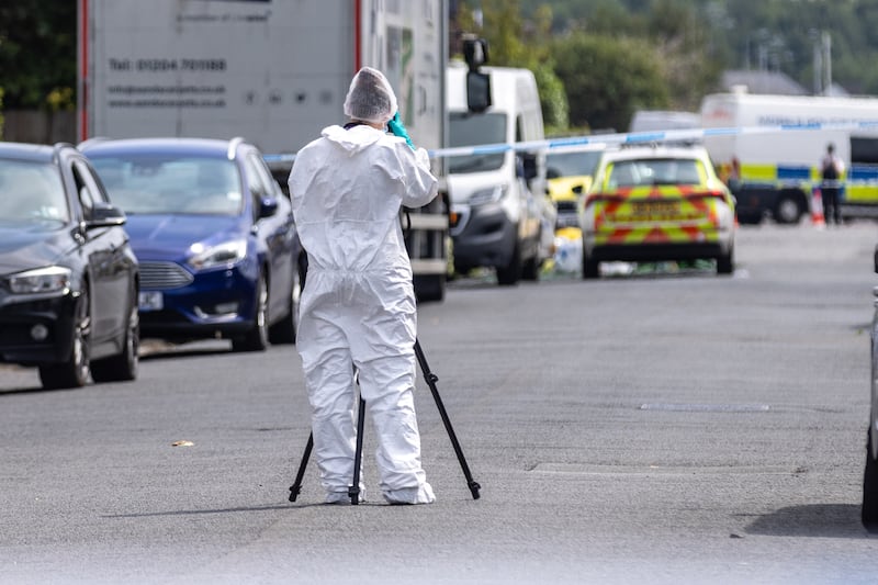 A forensic investigator in Hart Street, Southport, where three children died and eight were injured