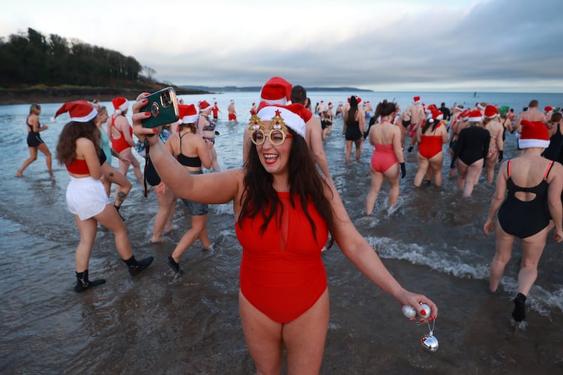 Laura Hawkins takes part in the annual Christmas Eve swim at Helen’s Bay