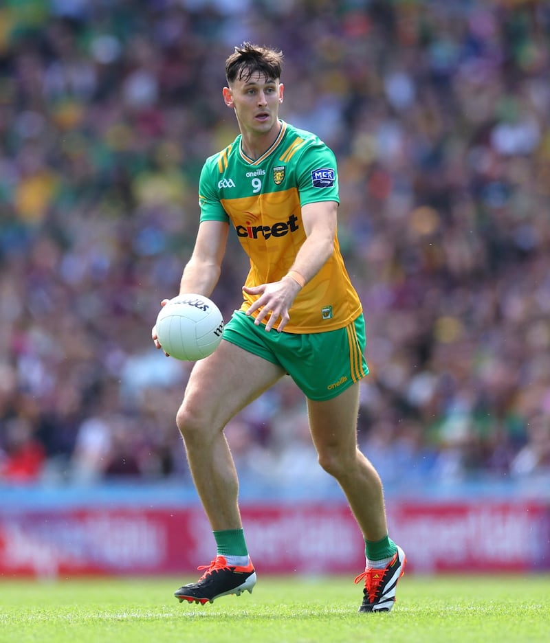 Michael Langan looking and preparing to kick a ball