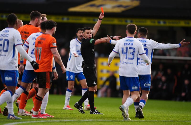 Referee Nick Walsh shows a red card to Rangers’ Mohamed Diomande (not pictured)