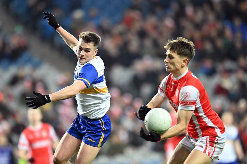 Ruairi Canavan of Errigal Ciaran in action against Michael Fitzsimons of Cuala