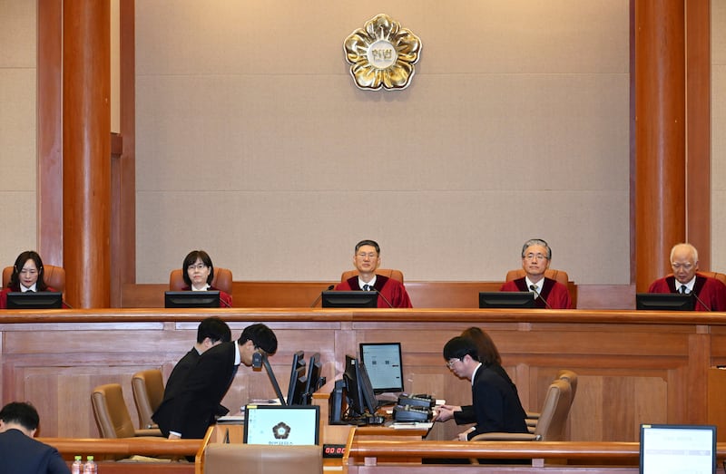 South Korea’s Constitutional Court sits for the first formal hearing of a trial on the validity of President Yoon Suk Yeol’s impeachment (Kim Min-Hee/Pool/AP)