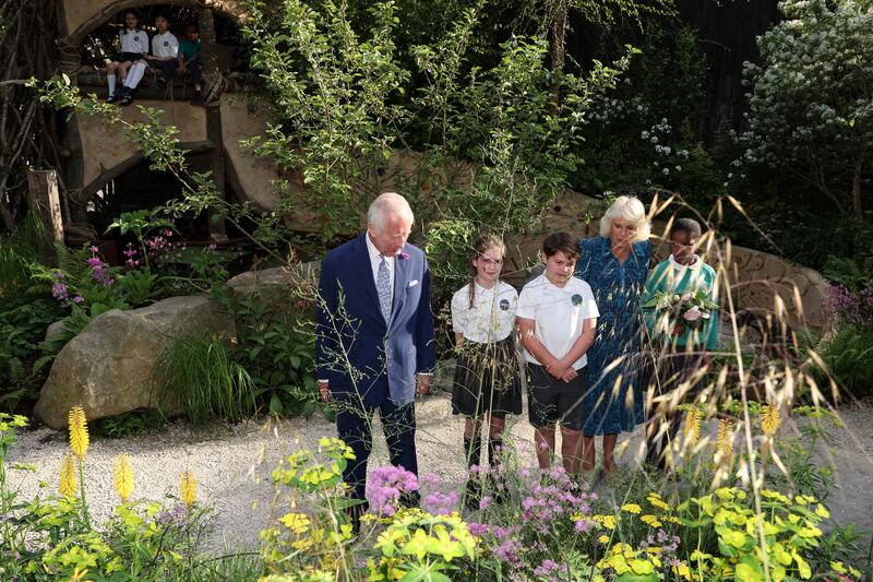 The King and Queen meet with pupils of the Sulivan Primary school as they visit the No Adults Allowed Garden