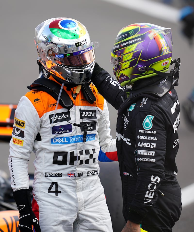 Lewis Hamilton, right, is supporting Lando Norris, left