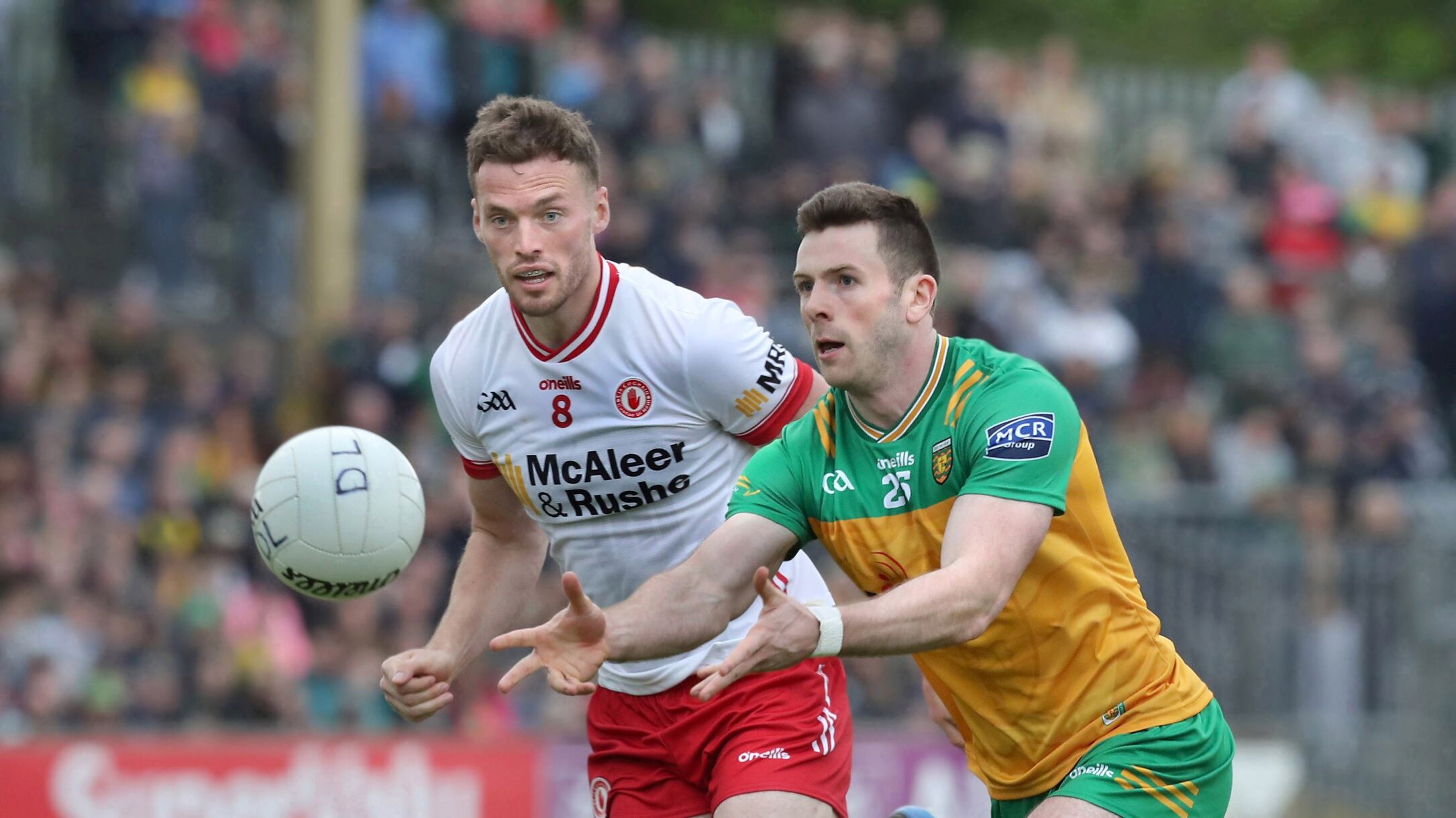 Brian Kennedy of Tyrone chasing after Donegal's Eoghan Bán Gallagher during an All-Ireland Senior Football Championship match