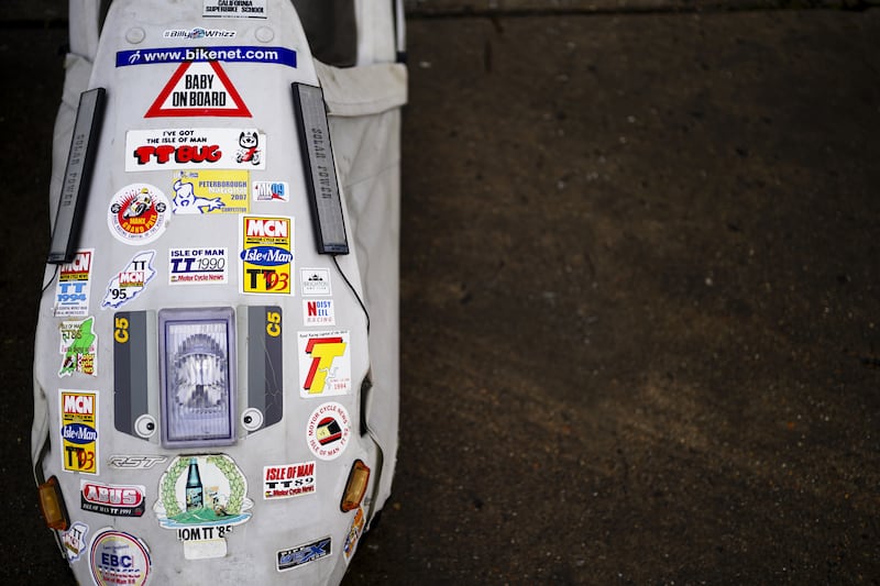 A Sinclair C5 decorated with a myriad of stickers