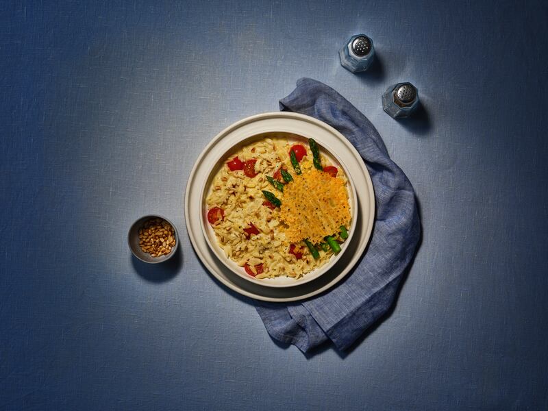 Bluey-inspired cheesy asparagus with tomato orzo recipe