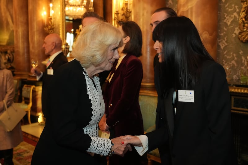 Queen Camilla with Claudia Winkleman during a reception to mark the centenary of the Film and TV charity, at Buckingham Palace, London