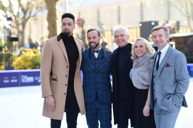 Presenter Phillip Schofield (centre) with judges (left to right) Ashley Banjo, Jason Gardiner, Jayne Torvill and Christopher Dean at the Natural History Museum ice rink