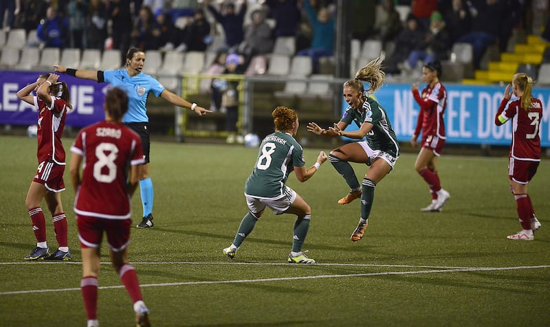 NI's Danielle Maxwell celebrates her equaliser against Hungary with Marissa Callaghan (8).