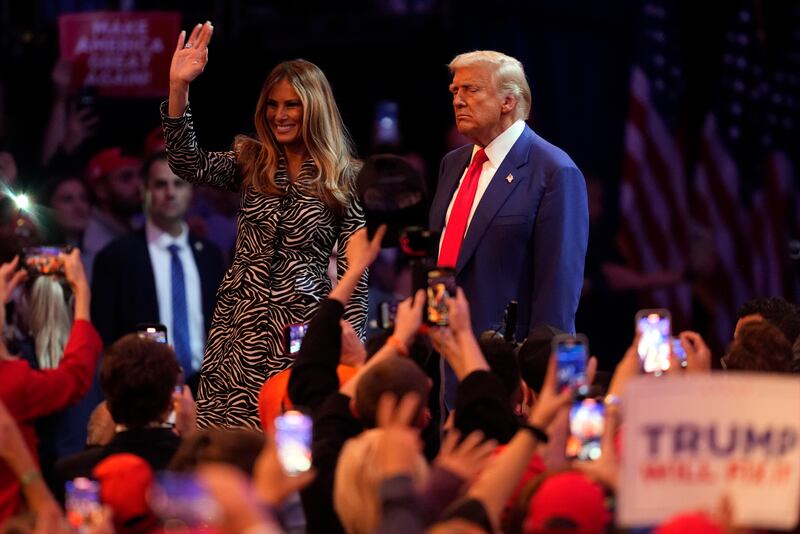 Republican presidential nominee former president Donald Trump and former first lady Melania Trump wave at a campaign rally at Madison Square Garden (AP/Evan Vucci)