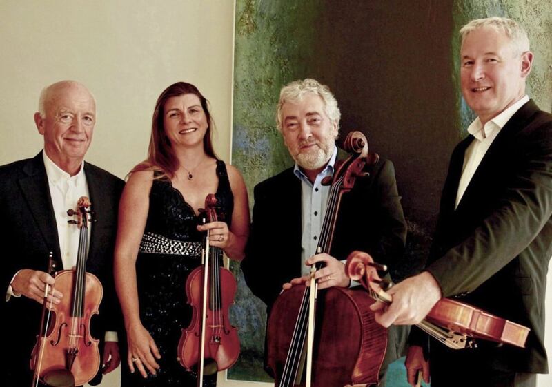 Neil Martin, second from right, with fellow members of the West Ocean String Quartet Seamus Maguire, Niamh Crowley and Kenneth Rice. Picture by Maurice Gunning 