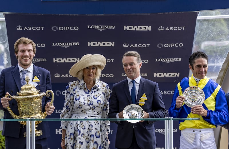 Owner Baron Philip Von Ullmann, Queen Camilla, owner Francis-Henri Graffard and Christophe Soumillon during the presentation during the King George VI And Queen Elizabeth Qipco Stakes at the Qipco King George Day at Ascot Racecourse, Berkshire