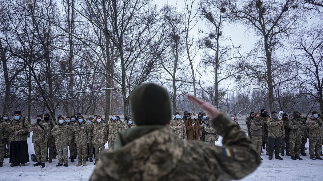 Members of Ukraine's Territorial Defense Forces, volunteer military units of the Armed Forces stay in line before training in Kharkiv, Ukraine, Saturday, January 29, 2022 (AP Photo/Evgeniy Maloletka)&nbsp;