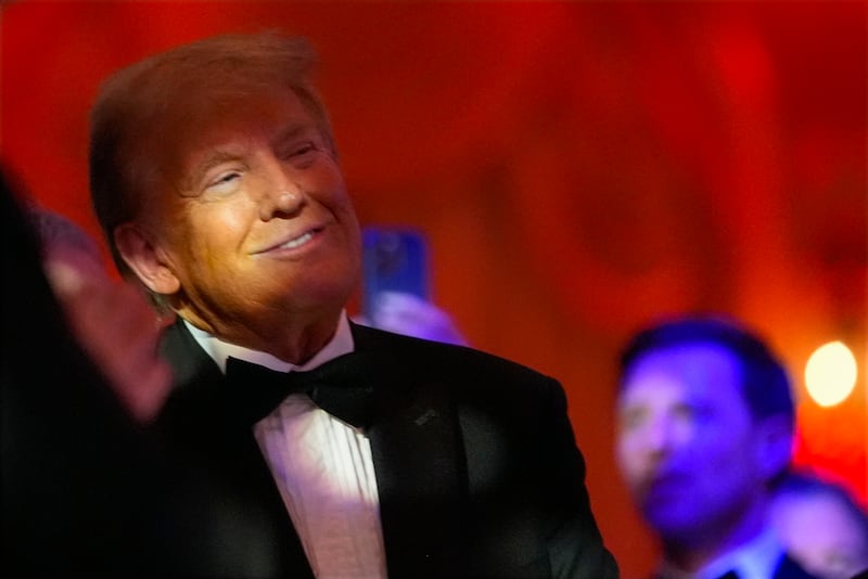 US President-elect Donald Trump smiles during an America First Policy Institute gala at his Mar-a-Lago estate (Alex Brandon/AP)