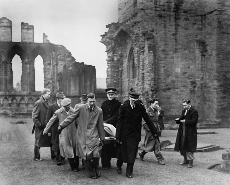 The Stone of Destiny being removed from Arbroath Abbey in 1951 after it was taken there by students trying to advance the cause of Scottish independence