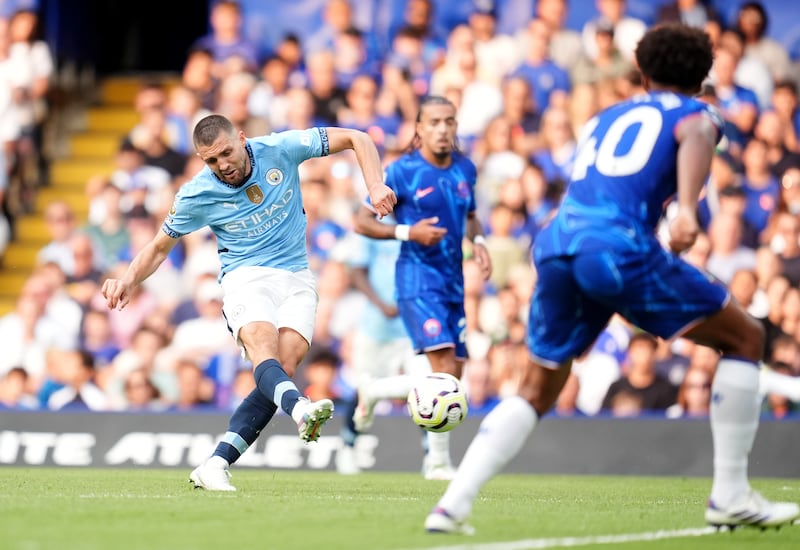 Mateo Kovacic, left, wrapped up the three points for City