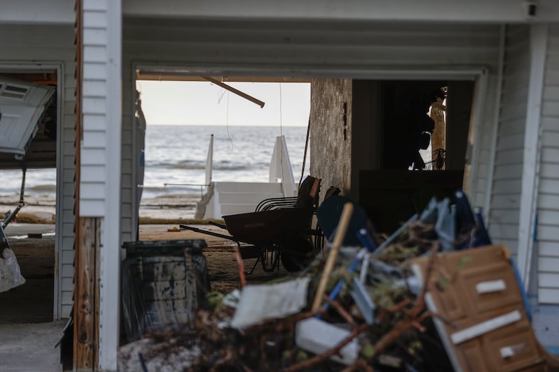 The storm surge from Hurricane Helene sent tonnes of sand into homes (Tampa Bay Times via AP)