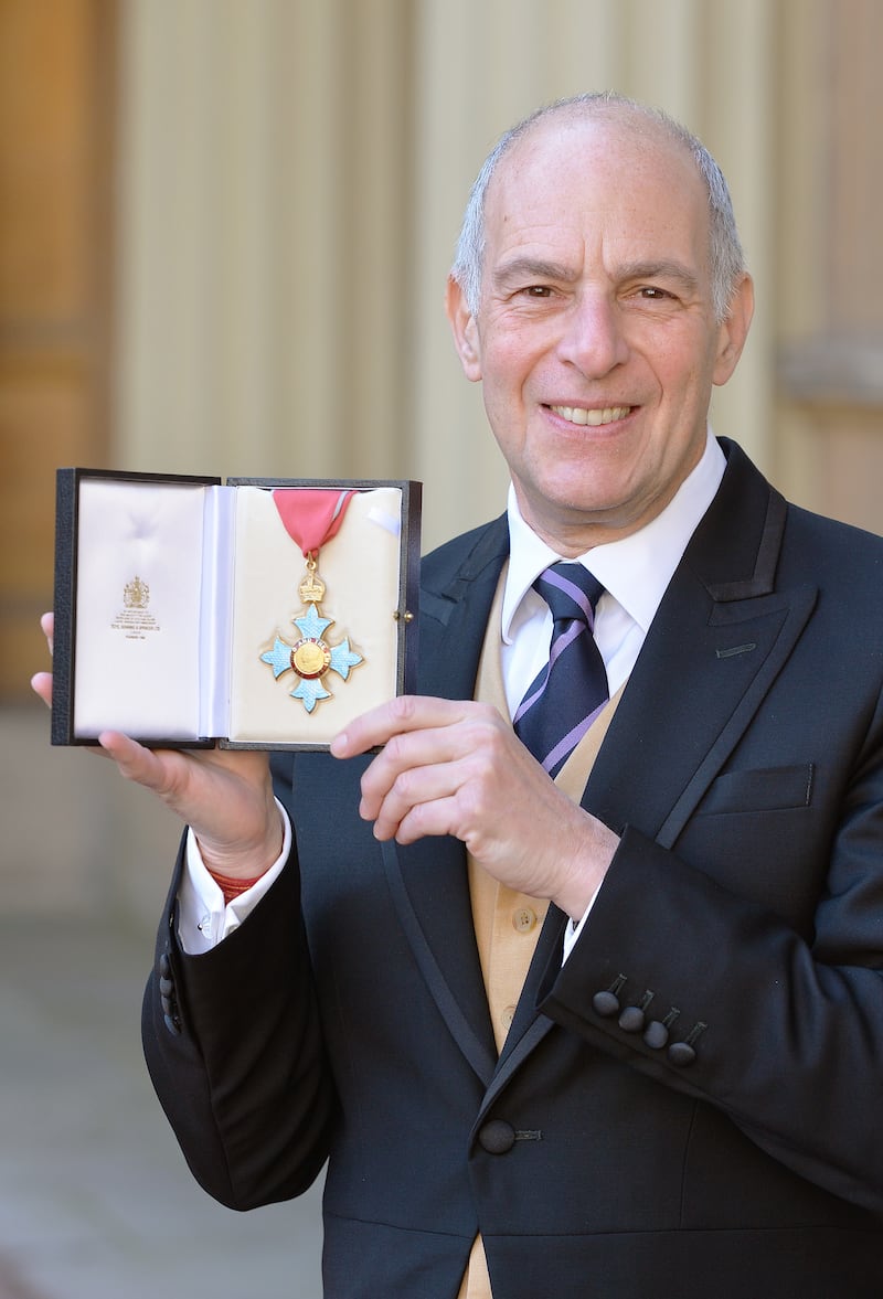 Loyd Grossman after being made a CBE at Buckingham Palace