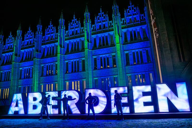 Illuminated letters spelling out Aberdeen have been placed in front of Marischal College