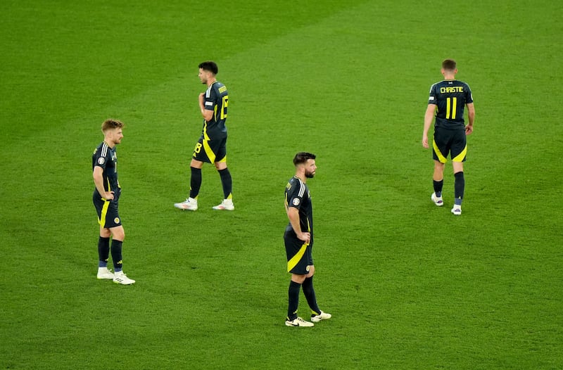 Scotland players dejected after the final whistle