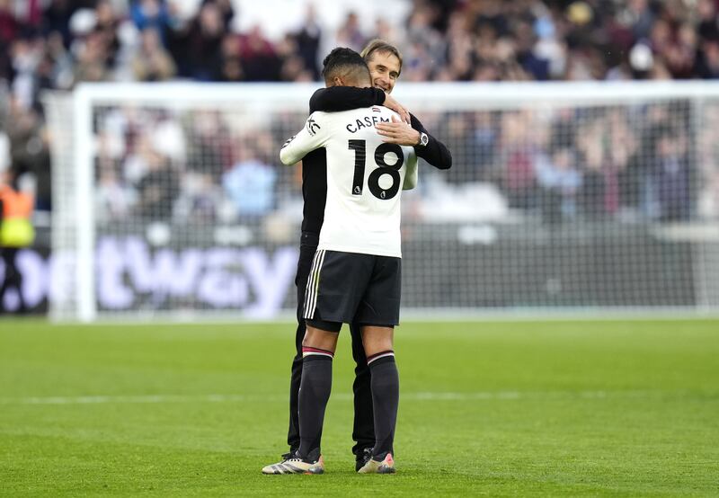 West Ham United manager Julen Lopetegui hugs Manchester United’s Casemiro