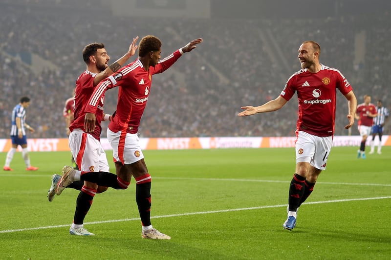 Marcus Rashford celebrates the opening goal (Luis Vieira/AP)